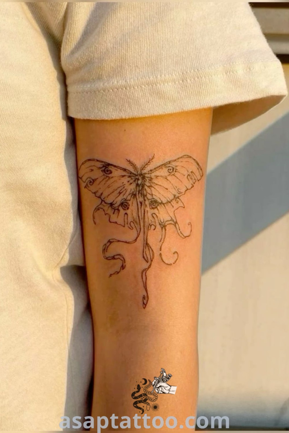 Small butterfly tattoo on right arm and leg, featuring intricate wings and bold artwork. A trendy, discreet design perfect for girly tattoo lovers. Discover more amazing tattoo ideas at asaptattoo.com.