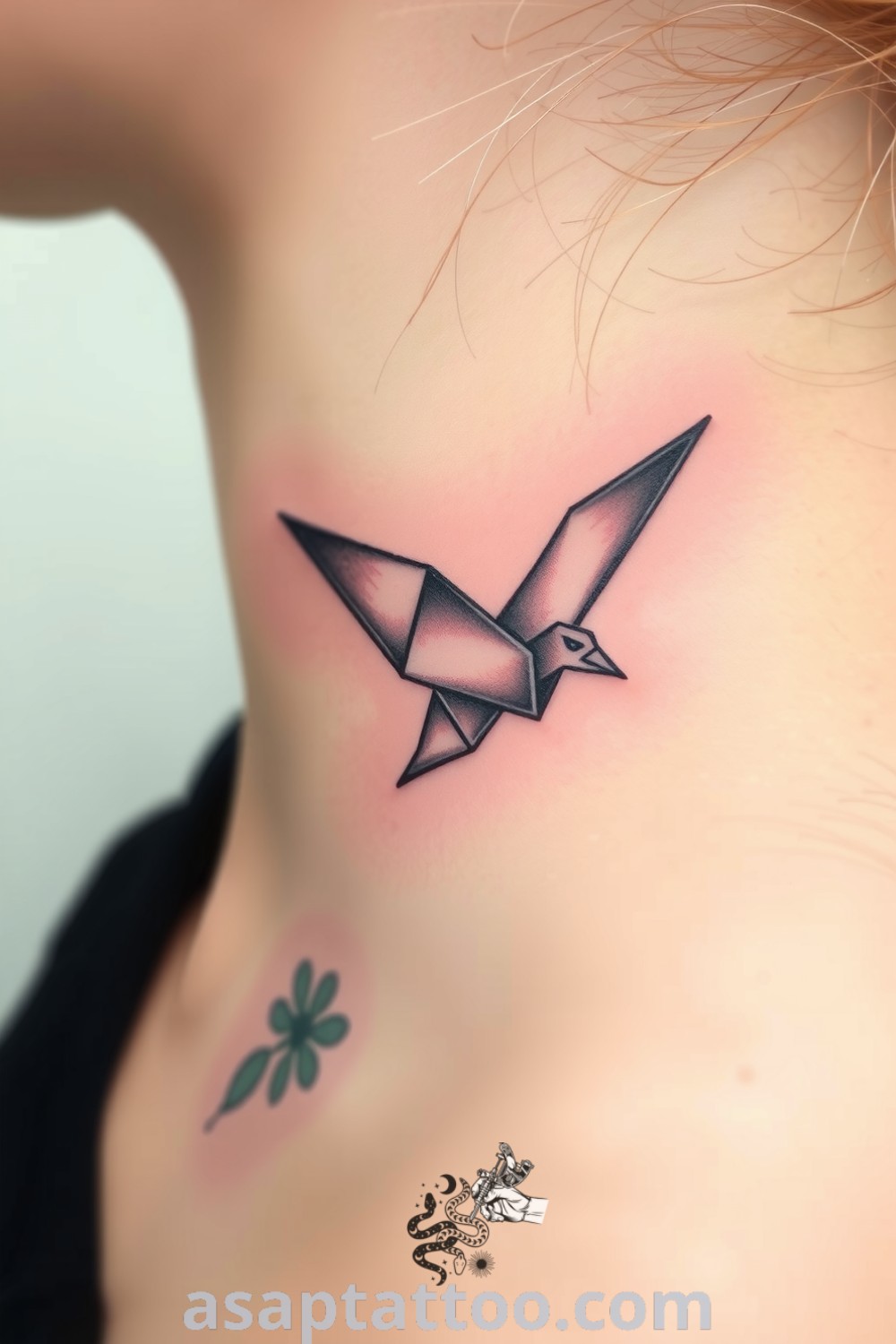Origami bird tattoo with intricate details in deep blacks and subtle grays, symbolizing freedom and transformation. A gorgeous tattoo idea you must see to believe. asaptattoo.com
