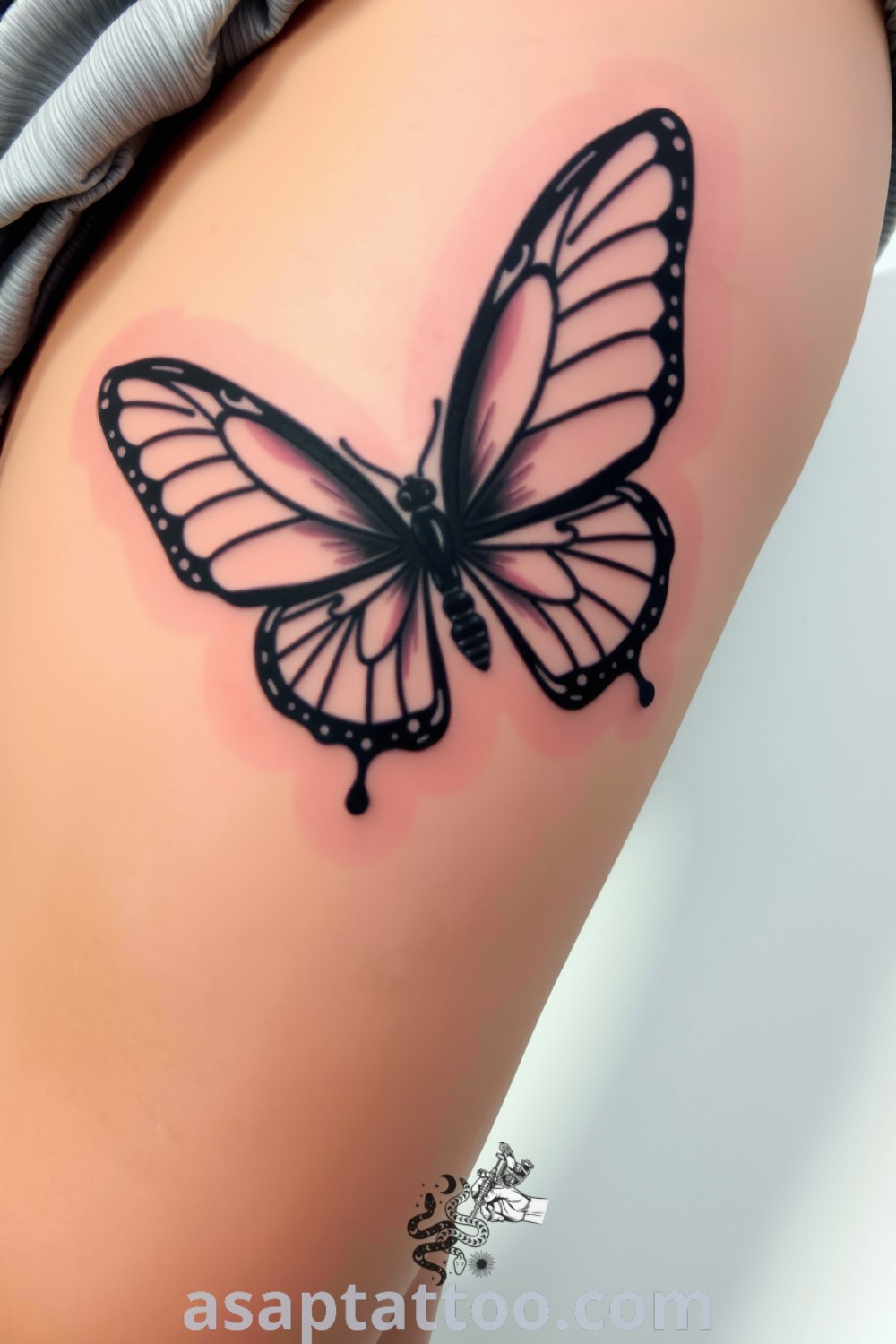 Intricate blackwork butterfly tattoo with sharp linework and stunning gradients, capturing the beauty of transformation and freedom. A gorgeous tattoo idea you must see. asaptattoo.com