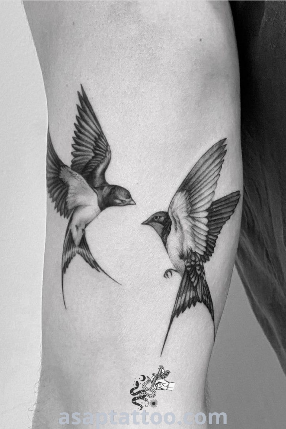 Two small birds tattoo design on the right arm and left leg, combining elements of swallow and sparrow tattoos for an elegant and meaningful look. Perfect for those seeking inspiring tattoo ideas at asaptattoo.com.
