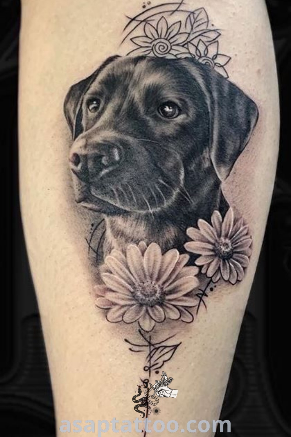 Black dog portrait tattoo with floral elements, showcasing artistic details in an elegant design. Perfect for women seeking dog-themed tattoo ideas and inspiration. Learn more at asaptattoo.com.