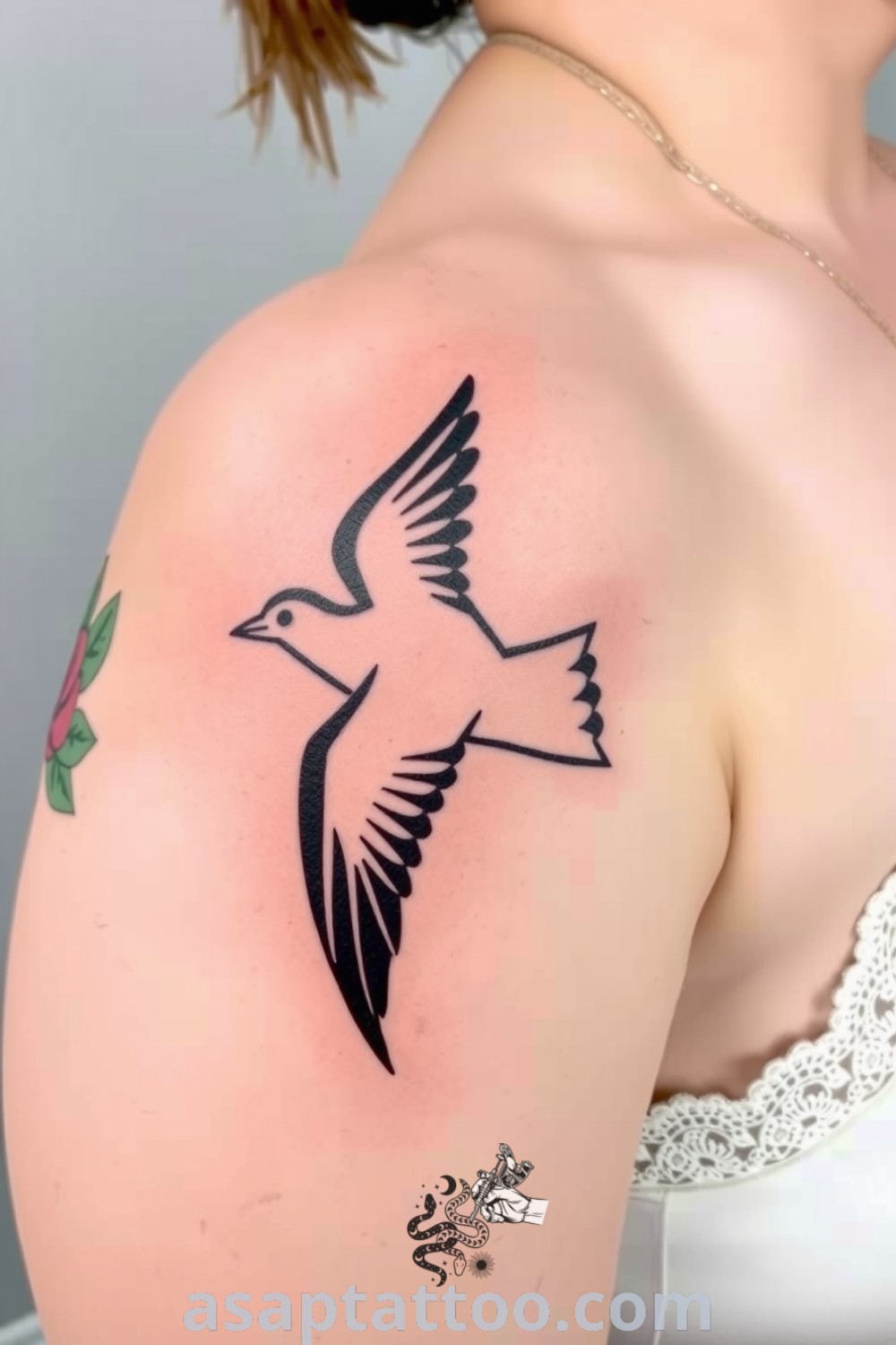 Stencil bird tattoo design showcasing bold lines and smooth gradients on light skin. An elegant tattoo with deep personal significance, you must see this amazing tattoo to inspire your next ink. asaptattoo.com
