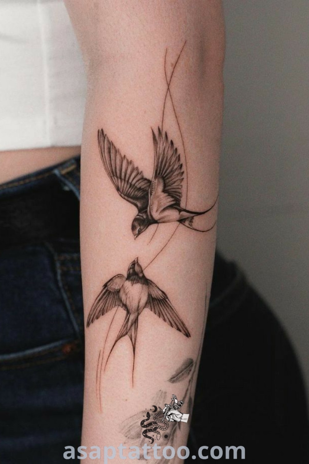 Elegant bird tattoo on a woman