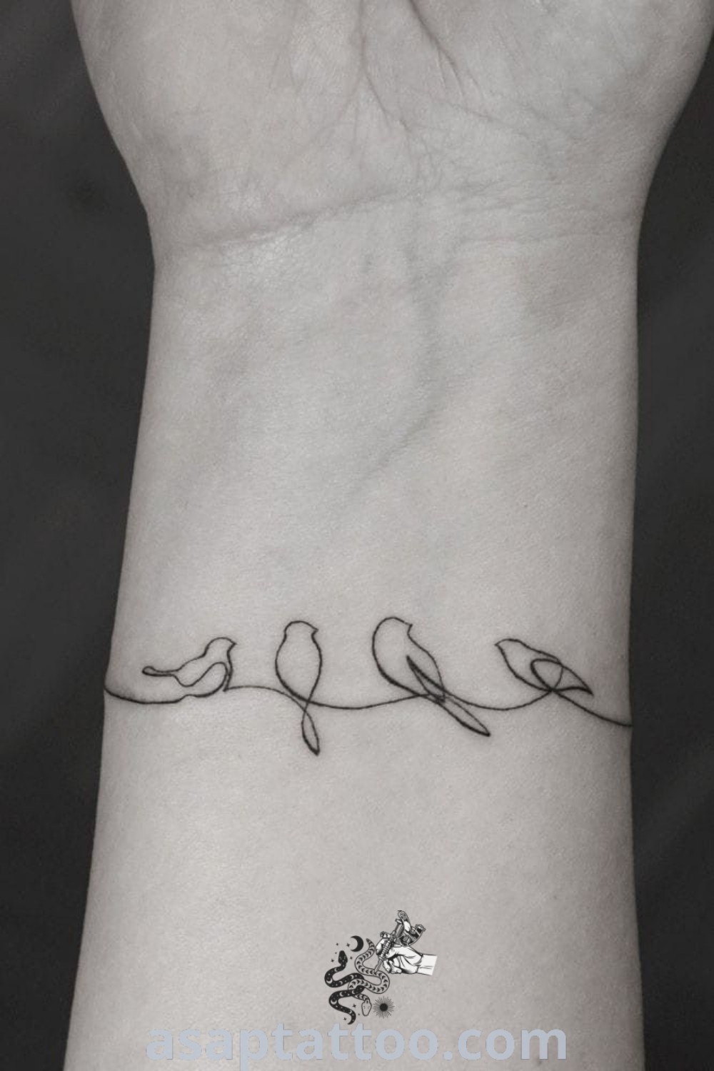 Elegant unalome tattoo with three birds on the line and one bird sitting on its side. A gorgeous wrist tattoo design featuring symbolic bird imagery, perfect for women seeking unique and meaningful tattoos. Explore best ideas and inspiring ink options at asaptattoo.com.