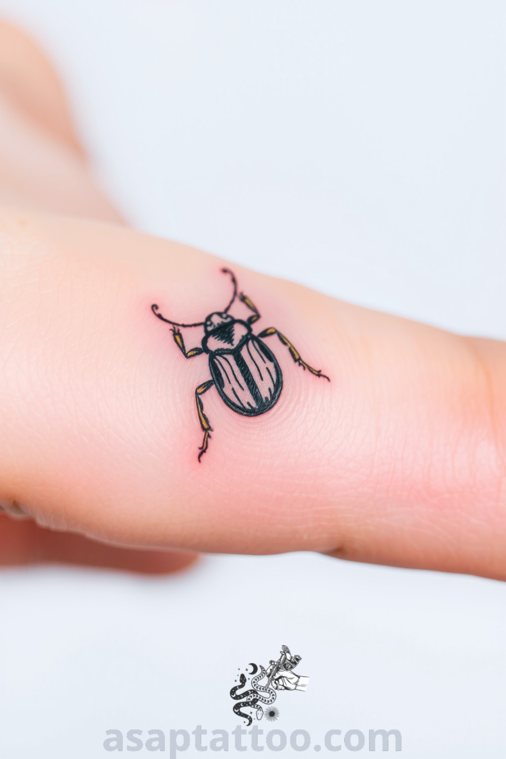 Intricate linework beetle tattoo with subtle gradients and soft shading, showcasing realistic texture and elegance. A gorgeous tattoo idea that will inspire you to get inked. asaptattoo.com