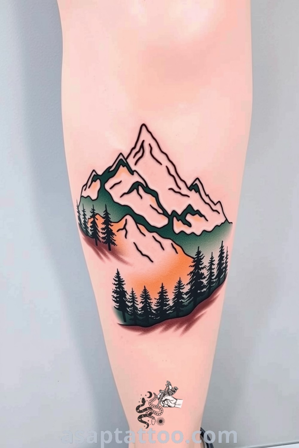 Elegant mountains and forest tattoo wrapping around the calf with intricate linework and a color palette of deep greens and earthy browns. A gorgeous tattoo idea you must see to believe. asaptattoo.com