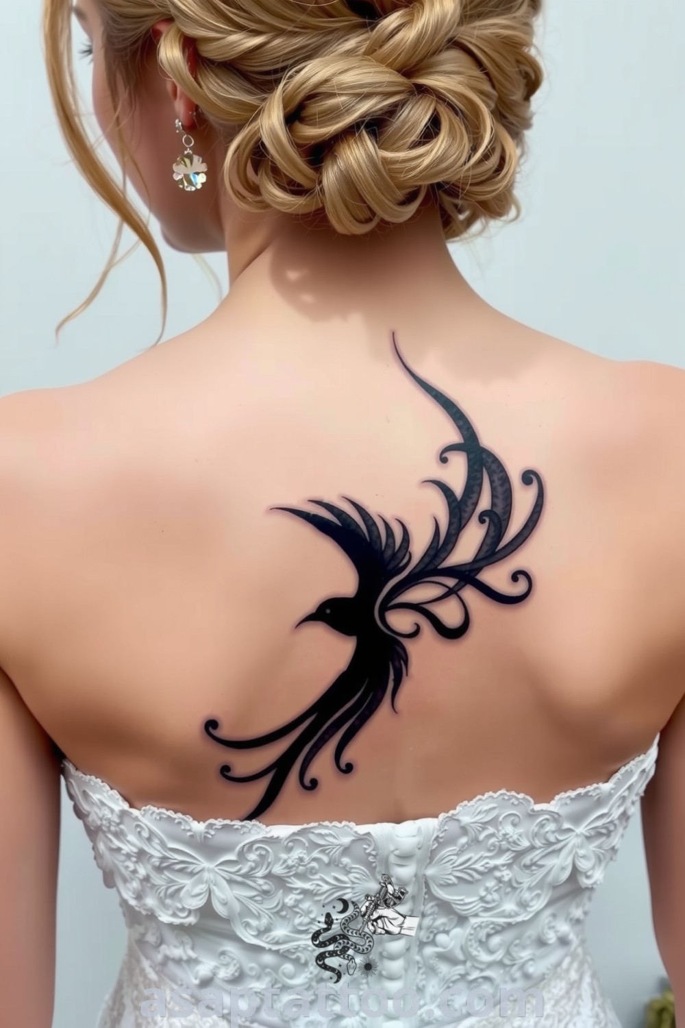 Calligraphy bird tattoo showcasing fluid lines and gray gradients symbolizing freedom and hope, a gorgeous design idea you must see. asaptattoo.com