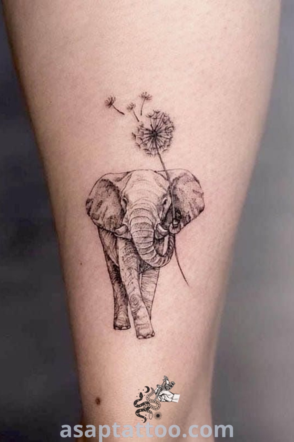 An elephant with a dandelion tattoo on its leg representing love and family connections. Discover inspiring elephant tattoos with artistic designs at asaptattoo.com.