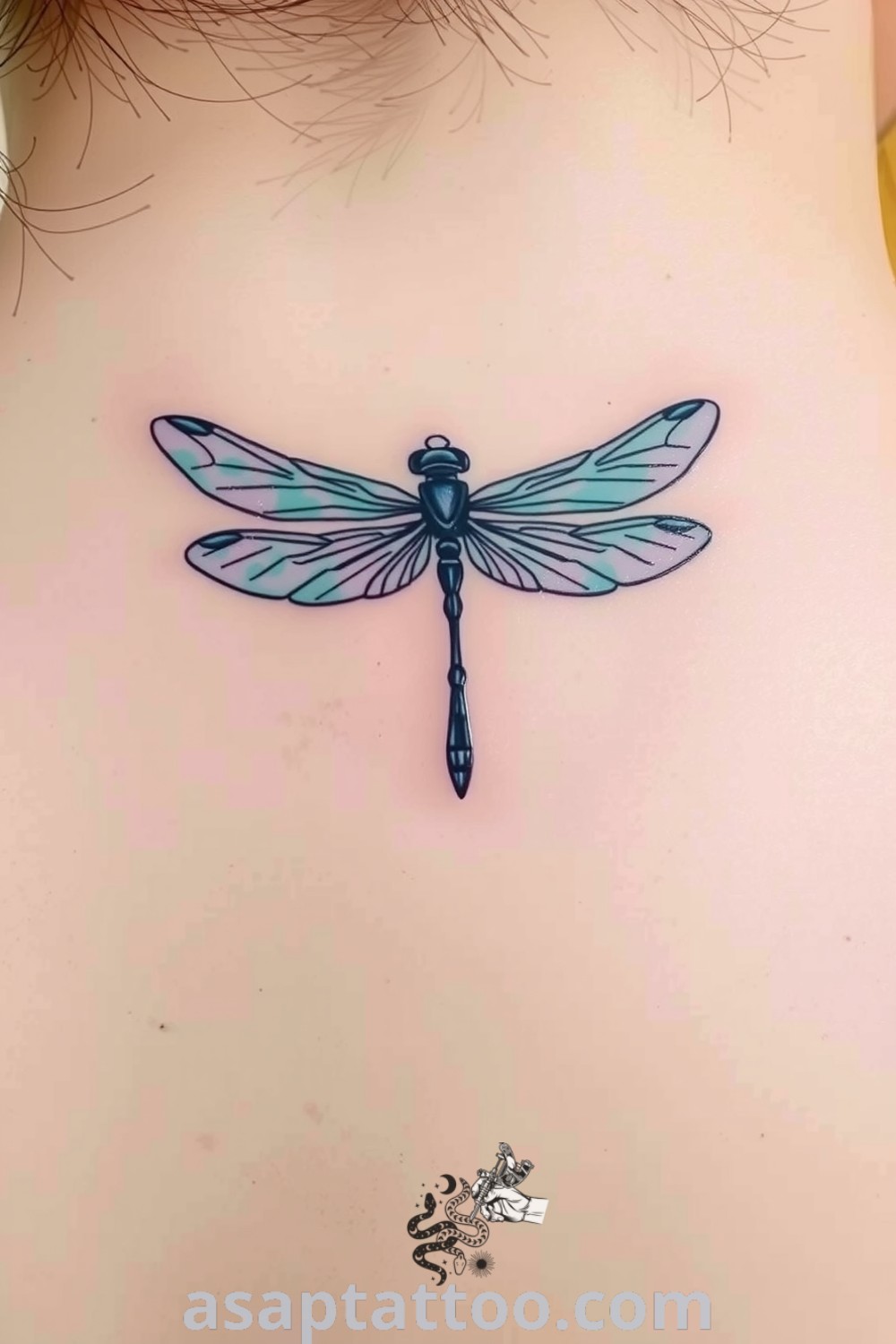 Ethereal dragonfly tattoo with iridescent wings in blues and greens, showcasing delicate linework and soft gradients. An elegant tattoo that inspires freedom and transformation, perfect for those looking to decorate their body with amazing designs. asaptattoo.com