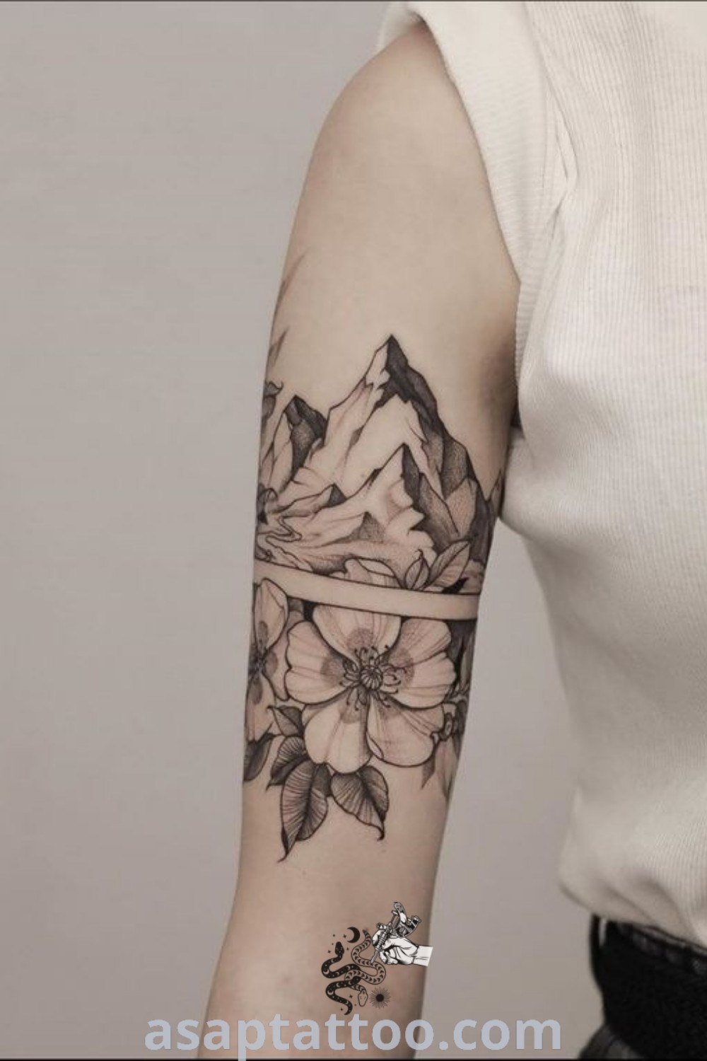 Mountain flower tattoo featuring a woman