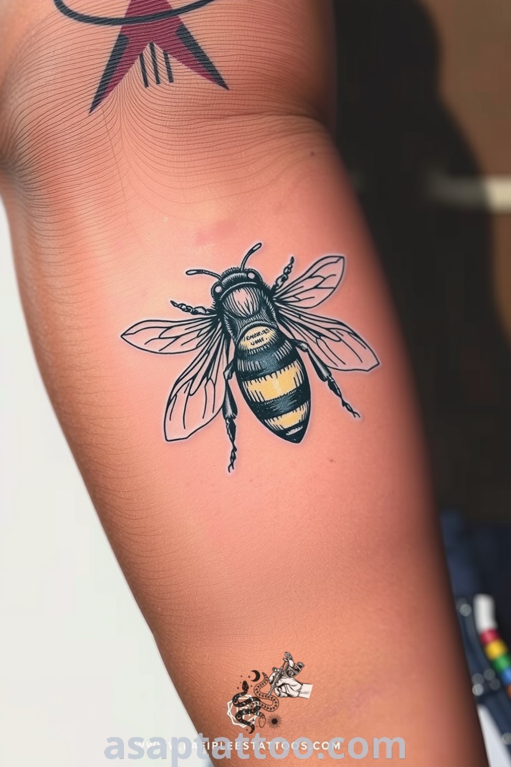 A beautifully detailed etching-style bee tattoo with fine linework and shading, showcasing a lifelike appearance. This striking piece is among the best tattoo ideas you have to see to believe. asaptattoo.com