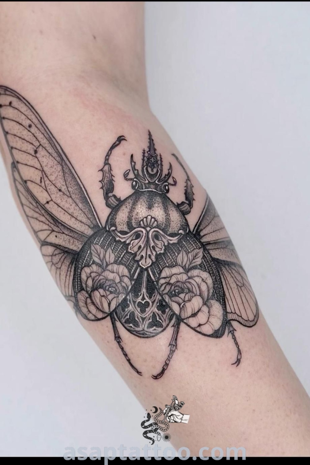 Stunning cicada and beetle tattoos in vibrant designs, showcasing armband tattoos and feather tattoos as ideal placements for elegant body art. Discover amazing tattoo ideas that will inspire you to get inked at asaptattoo.com.