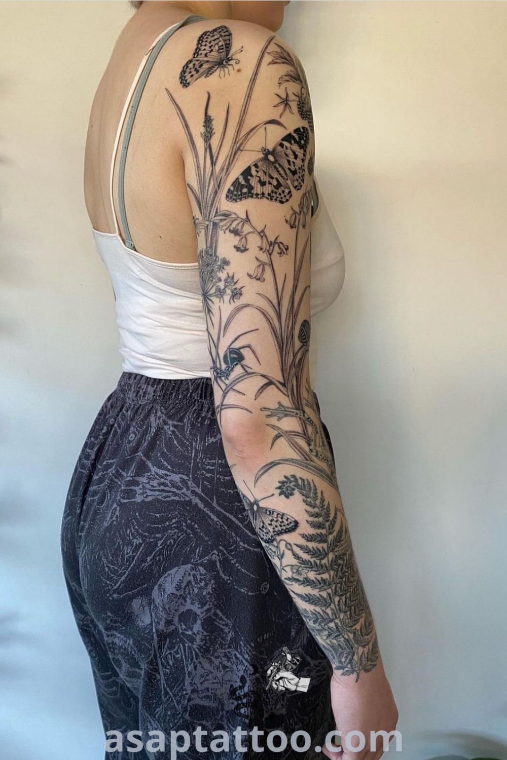 Intricate nature-inspired tattoo sleeve featuring wildlife and insect designs, perfect as tattoo ideas to celebrate the beauty of nature. Explore more at asaptattoo.com.