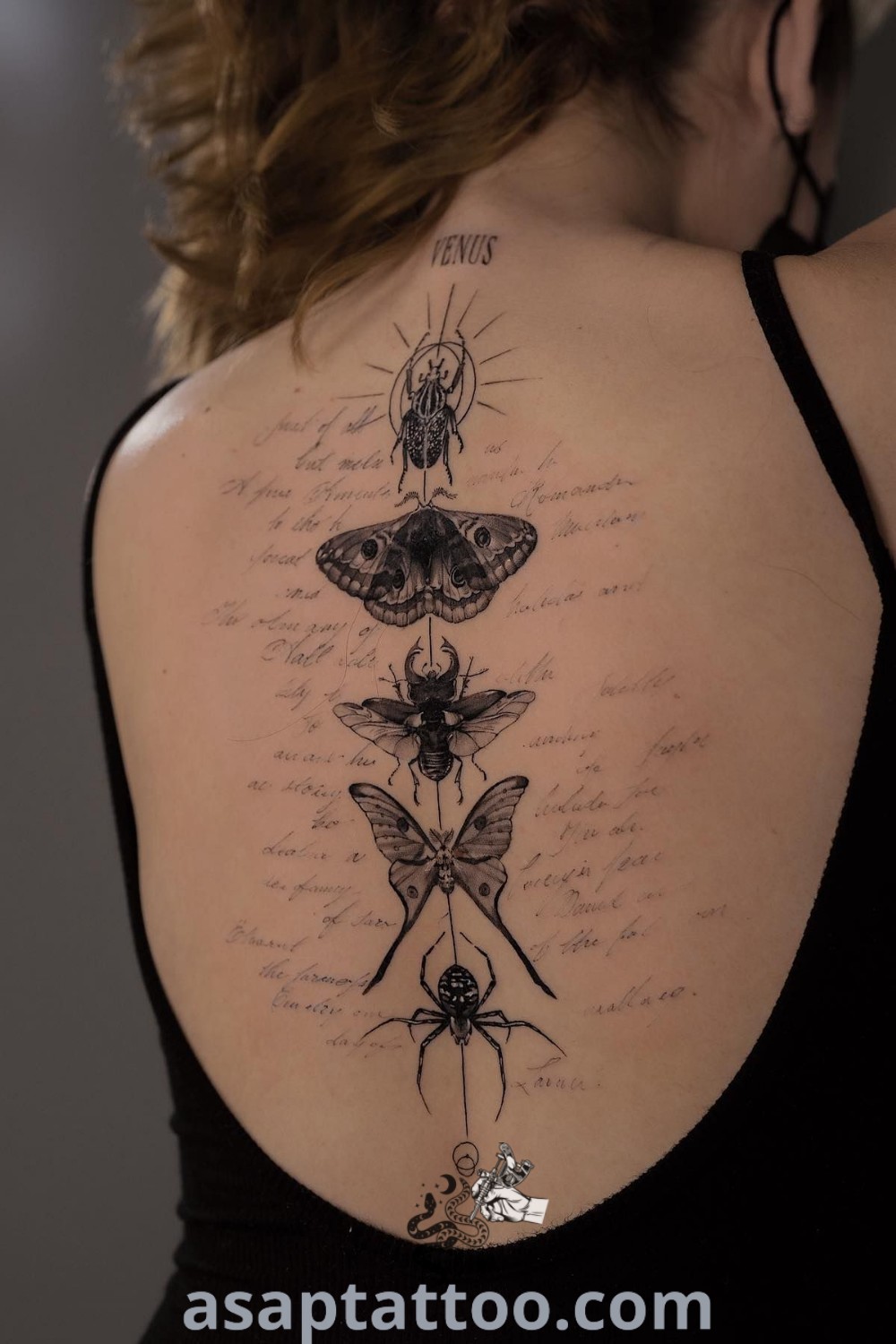 Spine bone tattoo on the back of a woman