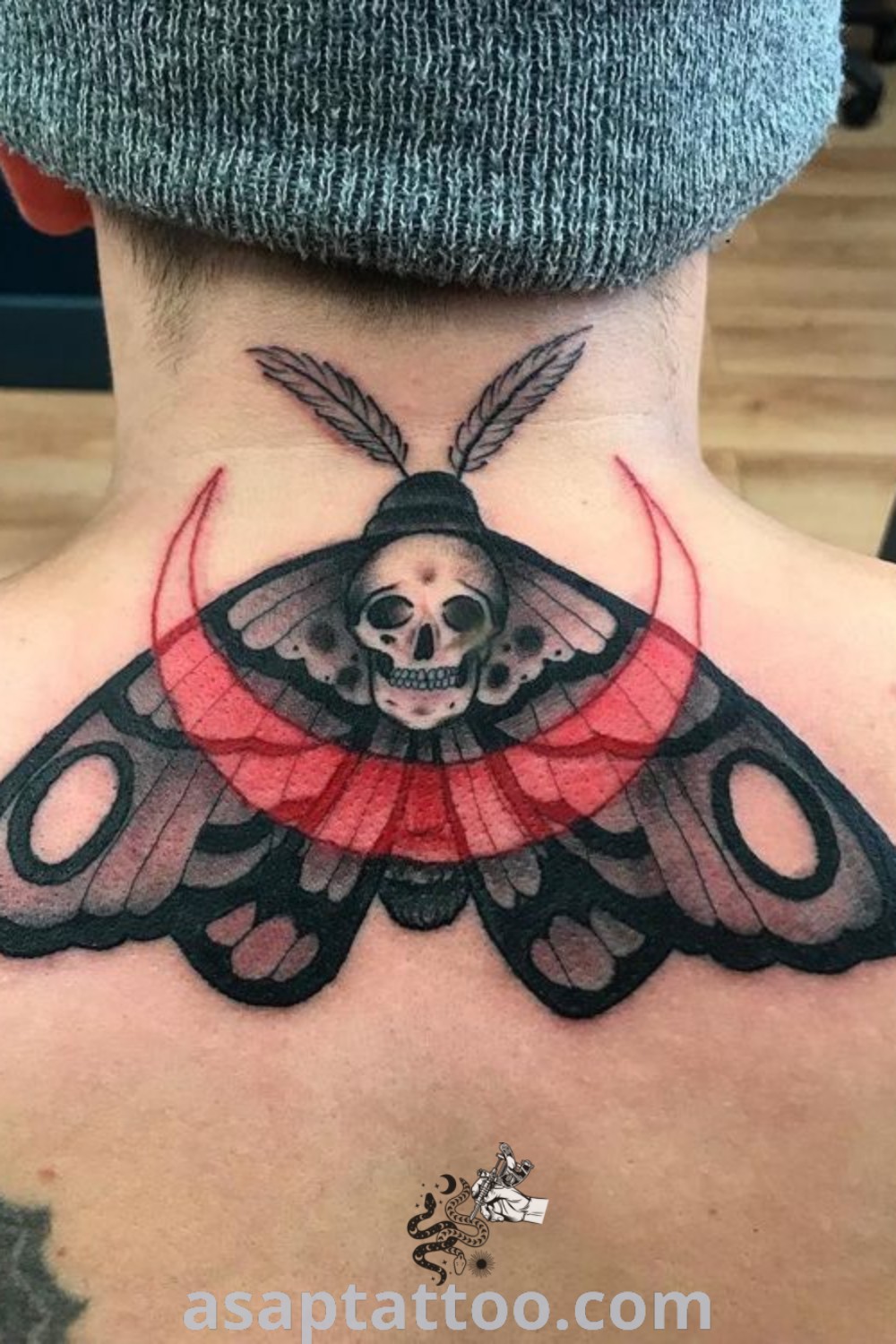 A mesmerizing moth tattoo on a man