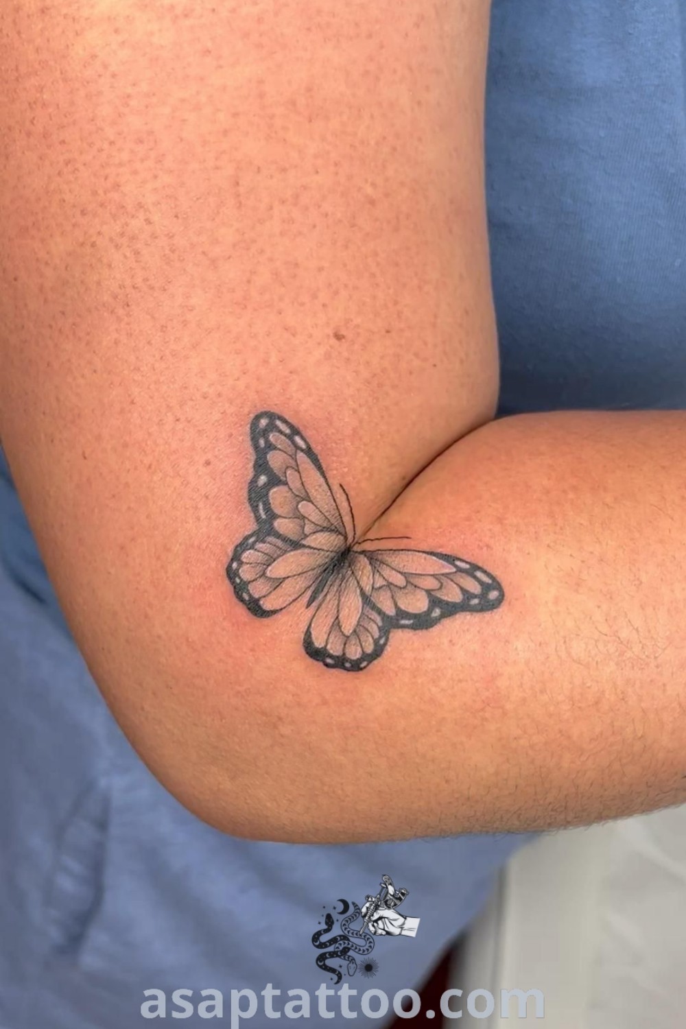 Elegant butterfly tattoo near elbow showcasing artistic features. Discover the best tattoo ideas that inspire your next ink at asaptattoo.com.