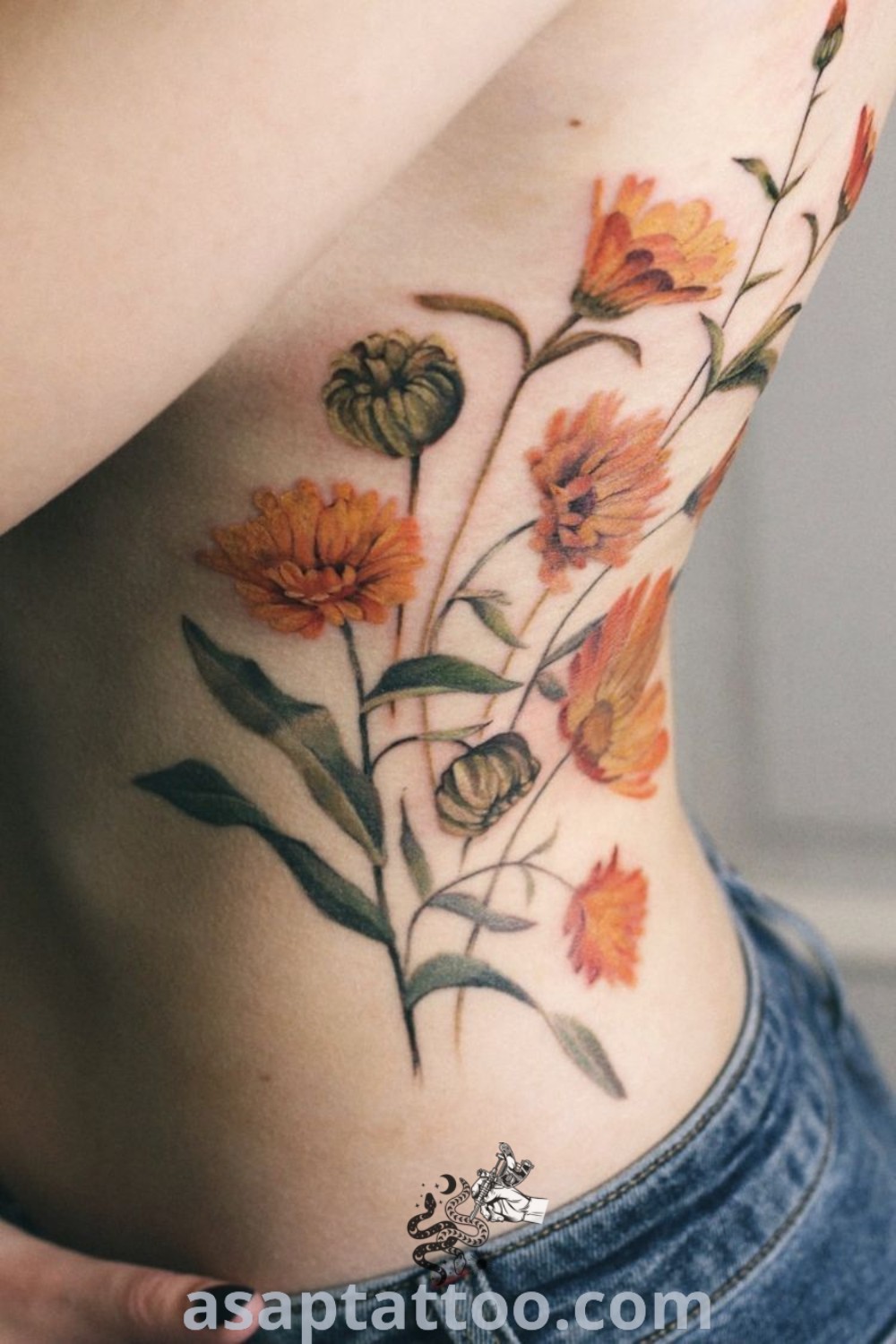 Floral painting tattoo on a woman
