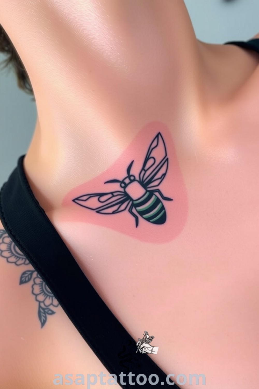 Silhouette bee tattoo in bold black lines with a subtle gradient, creating a striking effect on light skin. A gorgeous tattoo idea that symbolizes hard work and community you must see. asaptattoo.com