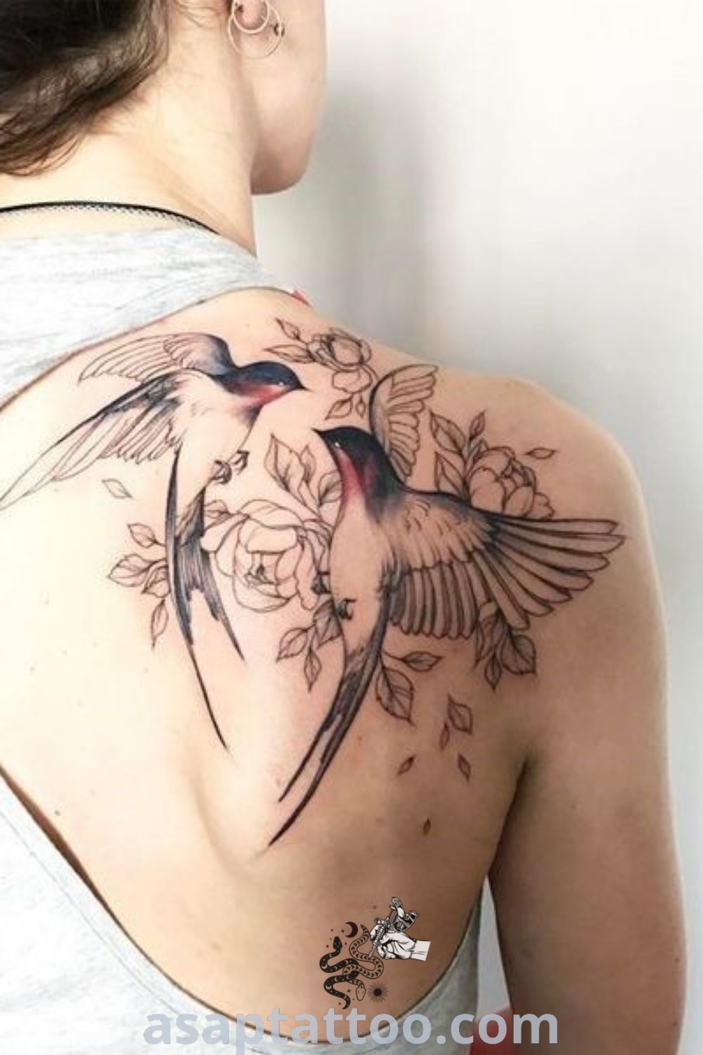 Elegant shoulder tattoo of a hummingbird with flowers, showcasing floral artistry and feminine design. A must-see tattoo idea for women seeking inspiring ink at asaptattoo.com.