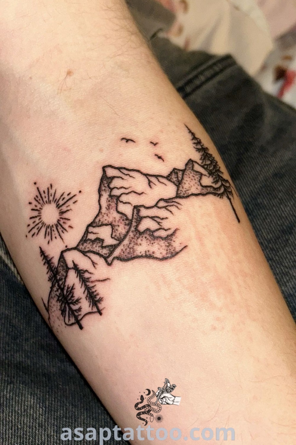 Elegant mountain and nature tattoos featuring a unique design of mountains, trees, and oceans, showcasing a stunning aesthetic that inspires meaningful body art. Discover the best ideas at asaptattoo.com.