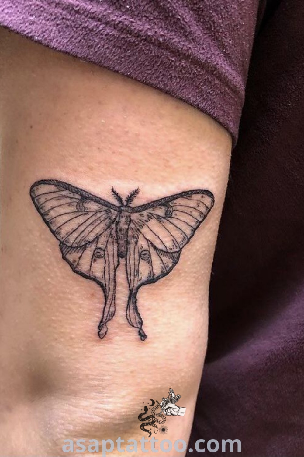 Small moth tattoo on the arm, showcasing elegant design and intricate details. A gorgeous choice for those seeking insect tattoos, perfect for tattoo lovers inspired by themes of nature. Discover more at asaptattoo.com.