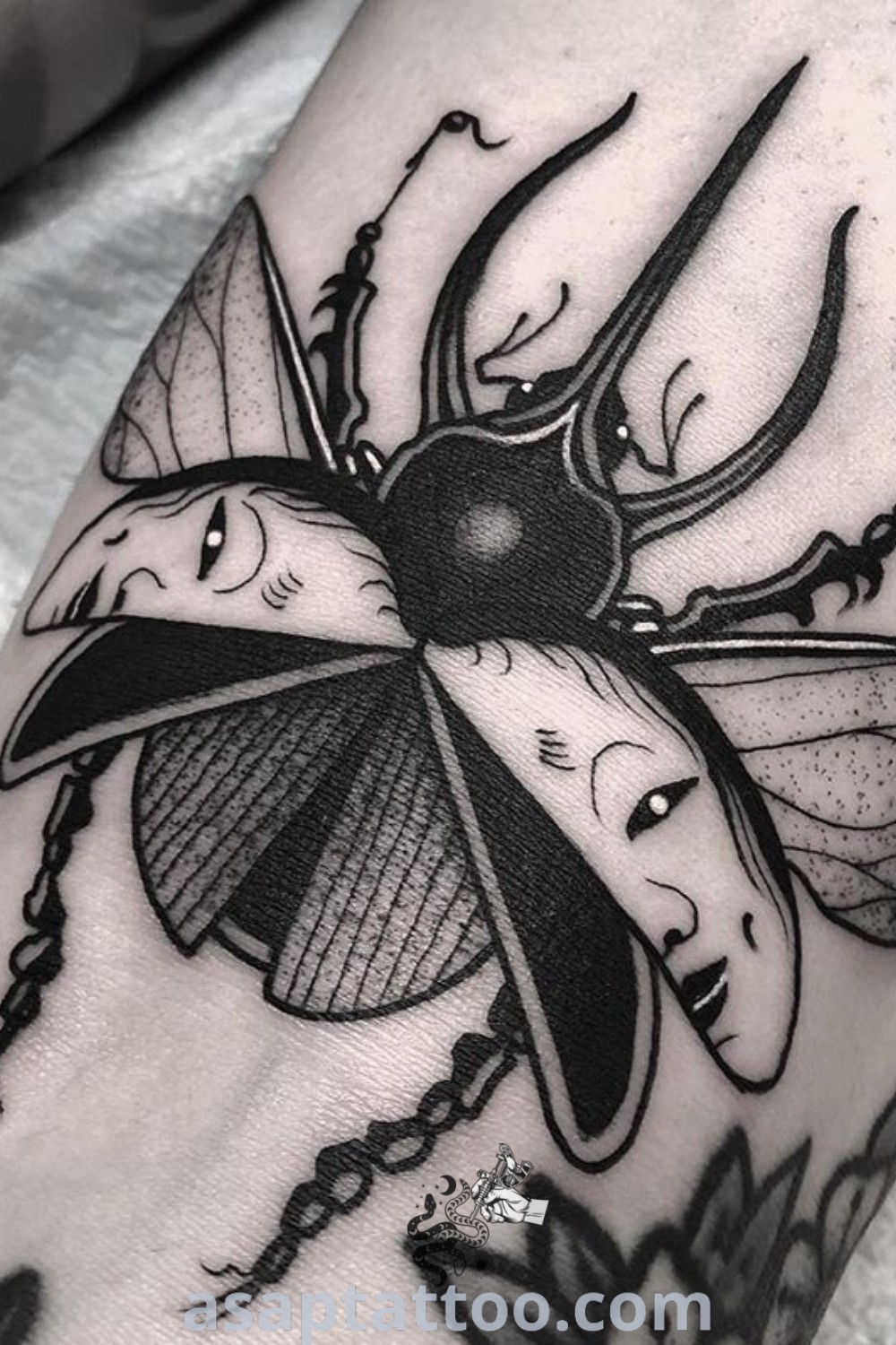 A black and white image of a bug tattoo featuring a rhinoceros beetle on a leg, exemplifying artistic tattoo designs. Perfect for those seeking inspiring ink ideas. Explore the best tattoo ideas at asaptattoo.com.