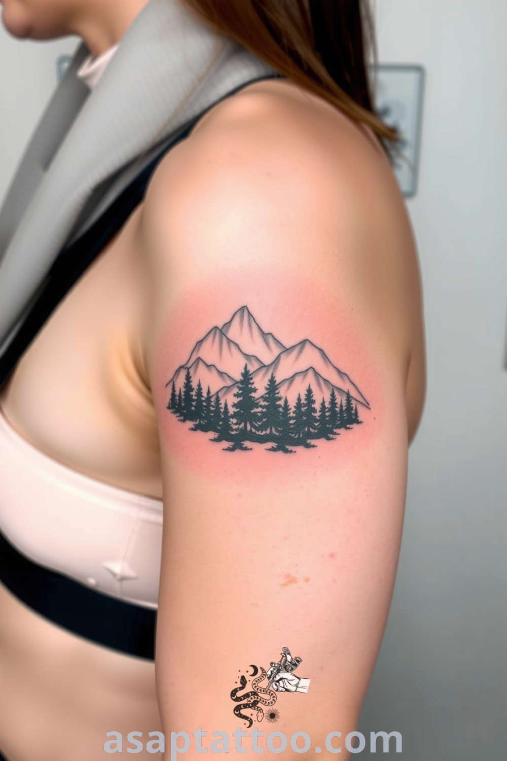 Intricate fine-line tattoo of a serene forest and majestic mountains with delicate linework and shading, creating depth and dimension. This elegant tattoo design is one of the best tattoo ideas you have to see to believe. asaptattoo.com