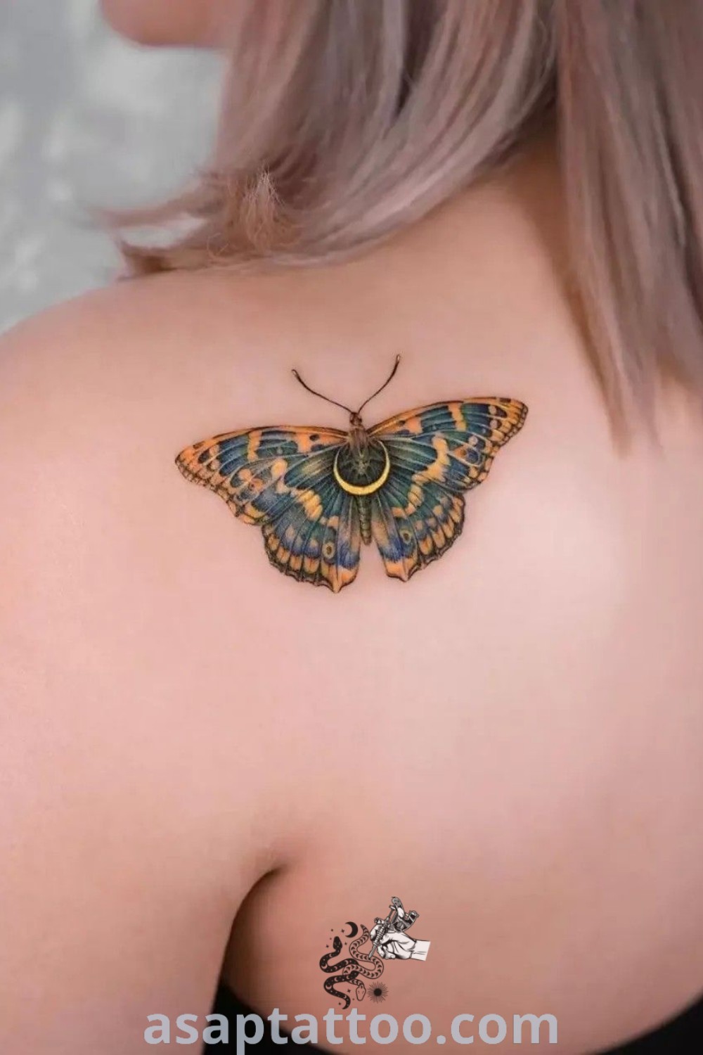 Butterfly tattoo on a woman