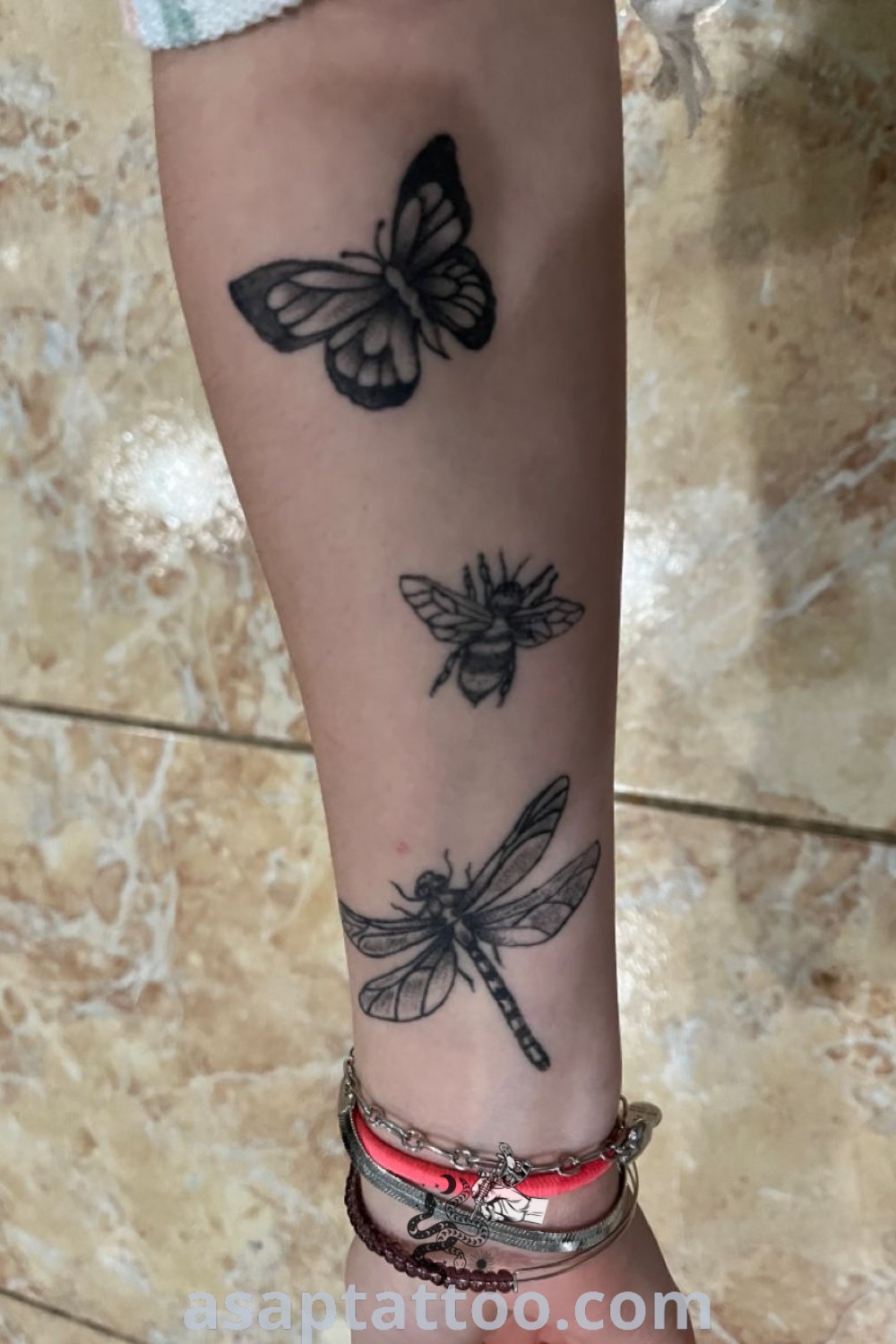 Inspiring butterfly and dragonfly tattoos showcasing elegant arm sleeve designs and intricate insect art. Perfect ideas for tattoos to melt your heart, available at asaptattoo.com.