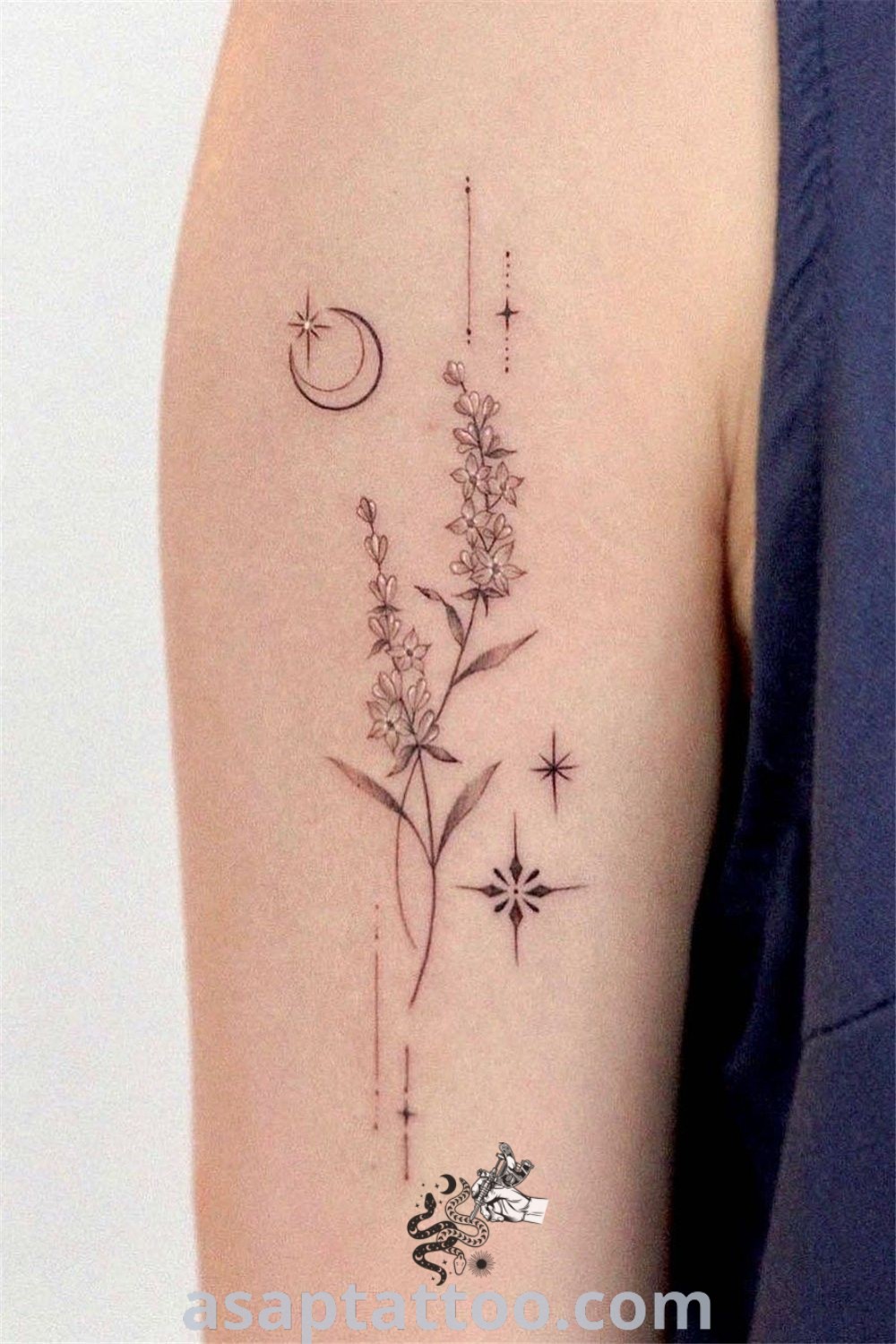 Elegant floral line tattoo on a woman