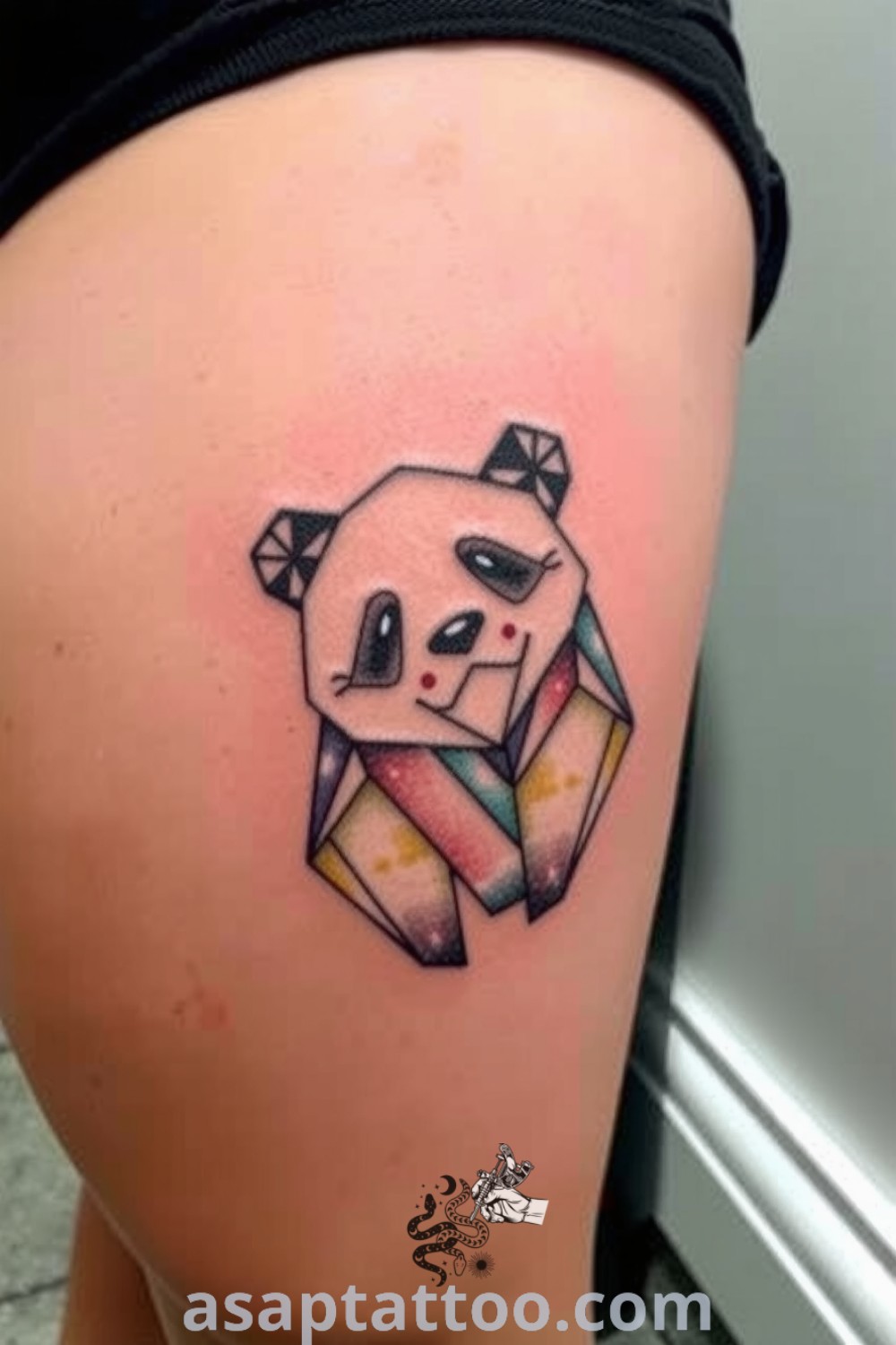Geometric panda tattoo with intricate linework, bold shapes, and subtle gradients, beautifully complementing medium skin tones. A gorgeous tattoo design that you must see to believe. asaptattoo.com