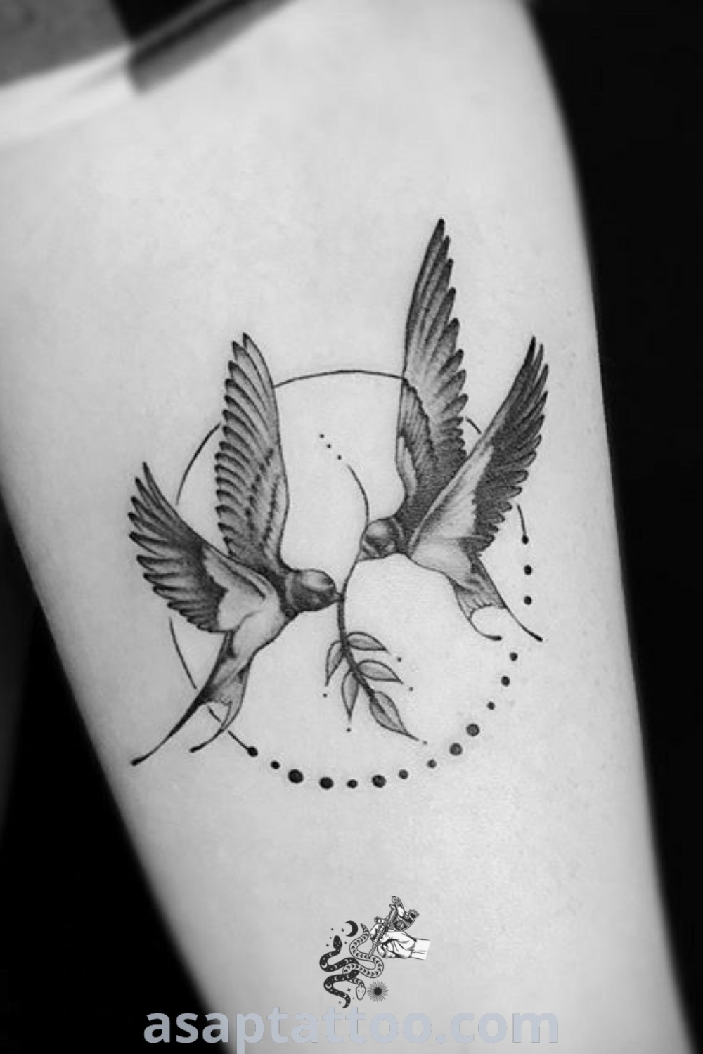 Pair of birds tattoo featuring geometric designs, elegant and meaningful, perfect for inner elbow tattoos and connecting tattoos. Explore more inspirational ideas at asaptattoo.com.