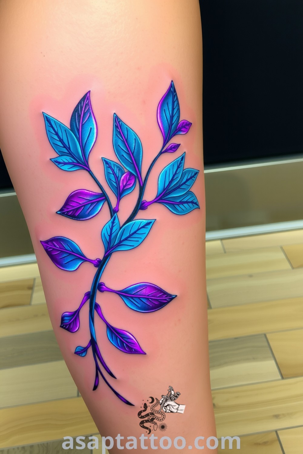 Cyberpunk plant tattoo with neon leaves in electric blues and purples, featuring intricate linework and gradients that enhance its depth. A gorgeous tattoo idea you must see to believe. asaptattoo.com