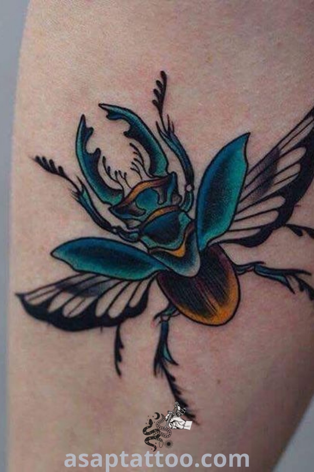 Elegant tattoo of a scarab with insect and flower design on a woman