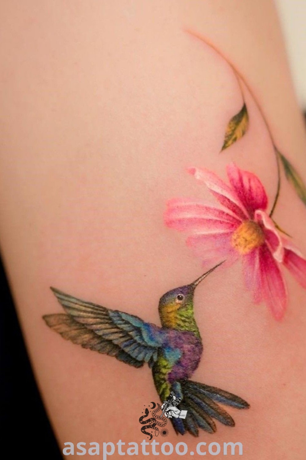 Elegant hummingbird flower tattoo design featuring a small hummingbird and lotus flower, perfect for women seeking beautiful tattoos with meaning. Discover incredible tattoo ideas at asaptattoo.com.