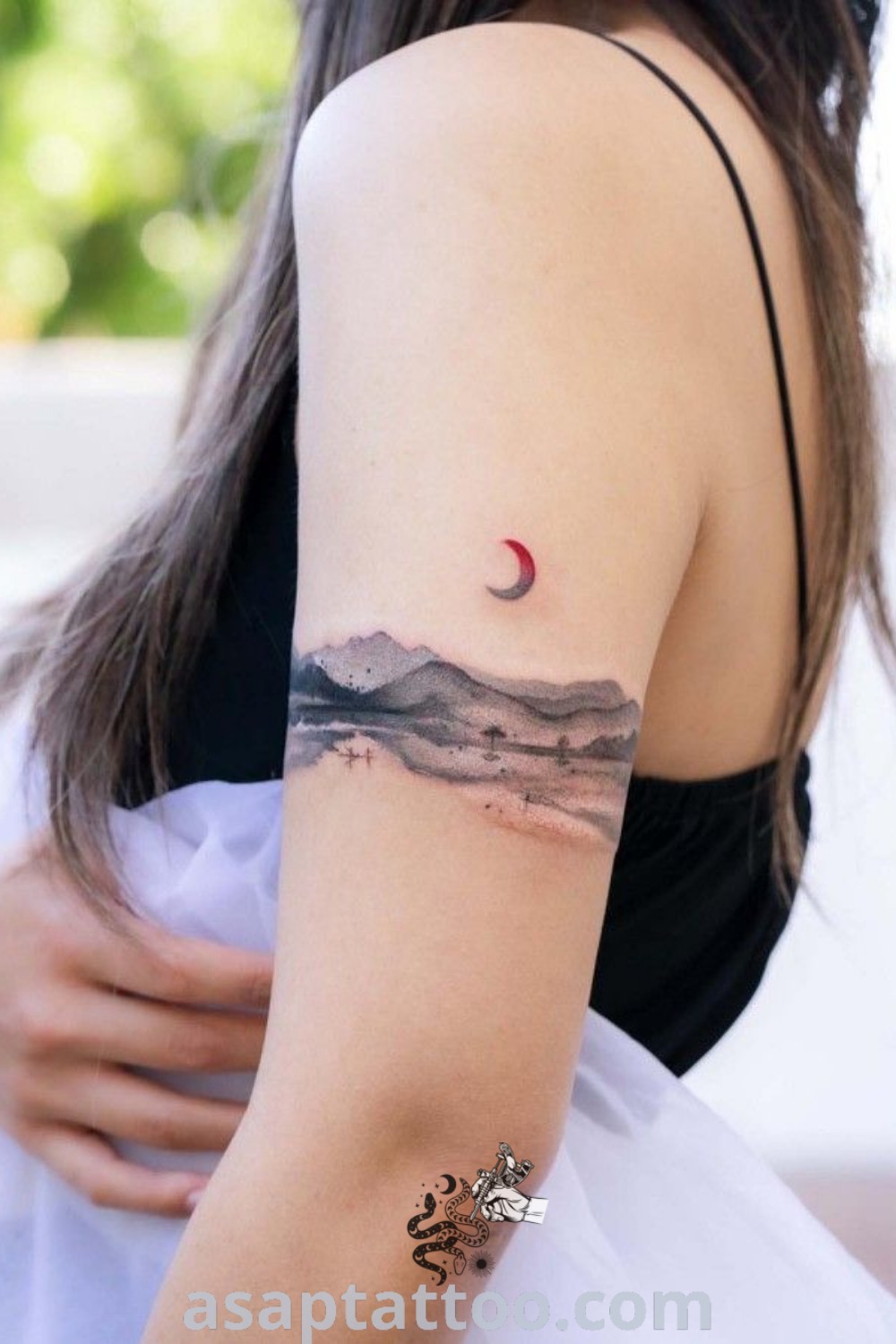 Mountain ocean tattoo featuring majestic mountains and flowing ocean waves. An awe-inspiring design that connects nature lovers with artistic expression. Find more amazing tattoo ideas at asaptattoo.com.