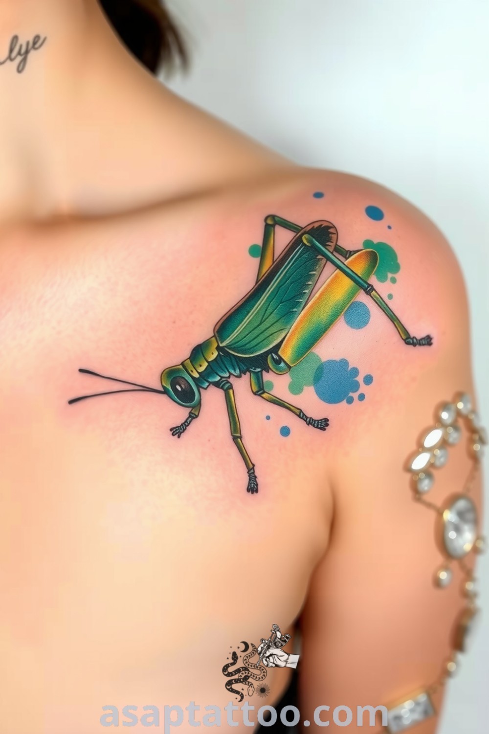 Watercolor grasshopper tattoo with rich greens and soft blues, showcasing intricate wing details and fine linework. A gorgeous tattoo idea that symbolizes transformation and resilience you must see. asaptattoo.com