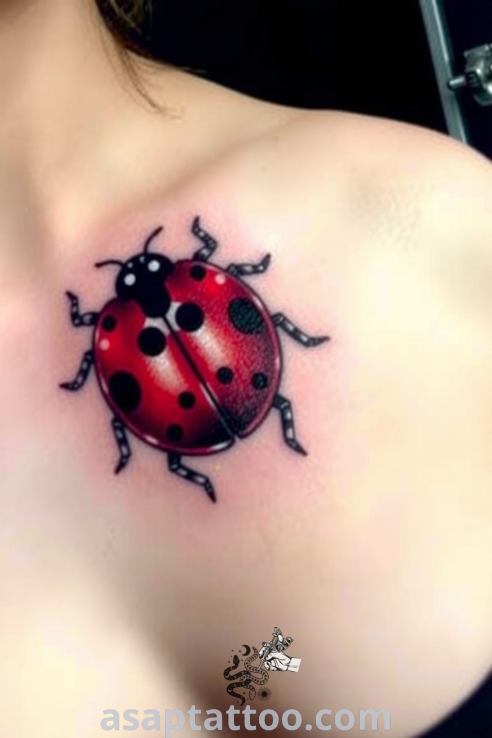 Ethereal ladybug tattoo in vibrant red and black with intricate linework and shading, showcasing a whimsical and nature-inspired design. A beautiful tattoo idea you must see. asaptattoo.com