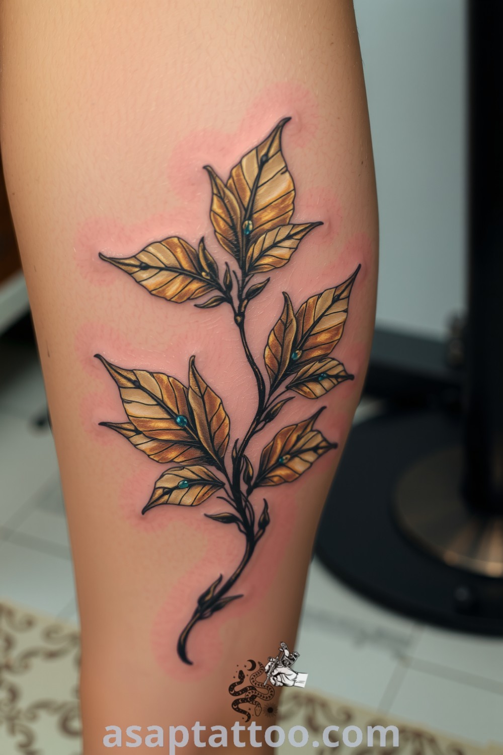 Steampunk plants tattoo featuring intricate mechanical leaves in brass tones, showcasing elegant linework and gradients. A gorgeous tattoo idea that beautifully blends nature and industry, you must see. asaptattoo.com