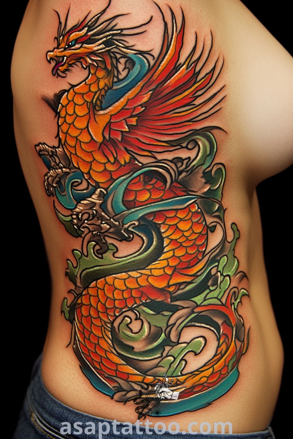 Phoenix chest tattoo featuring fiery reds and oranges blending into deep blues and greens, showcasing exquisite linework and intricate details. A gorgeous tattoo idea that symbolizes rebirth and resilience you must see to believe. asaptattoo.com