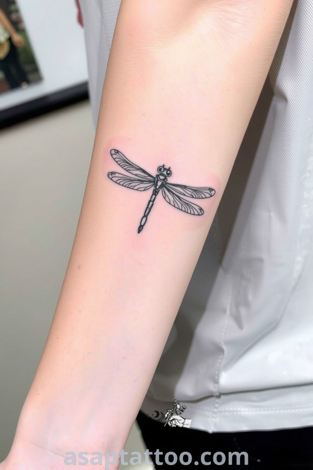 Intricate dragonfly tattoo with elegant linework and soft shading, capturing movement and grace. A gorgeous tattoo idea that symbolizes transformation and freedom you must see. asaptattoo.com