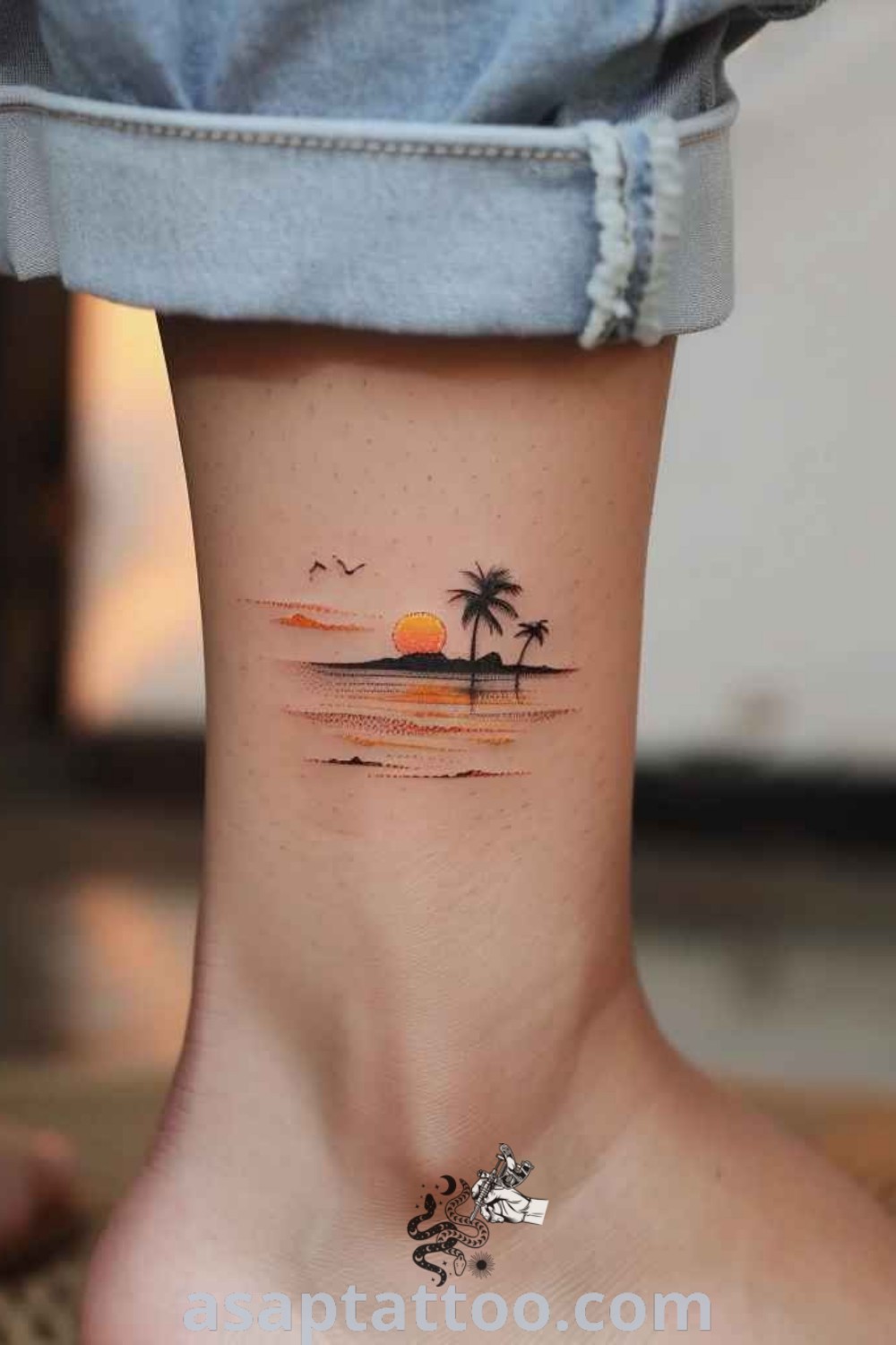 Delicate sunset tattoo with minimalist design, featuring tiny palm trees and gentle ripples. A stunning option for small sunset and beach tattoos for women. Explore more at asaptattoo.com.