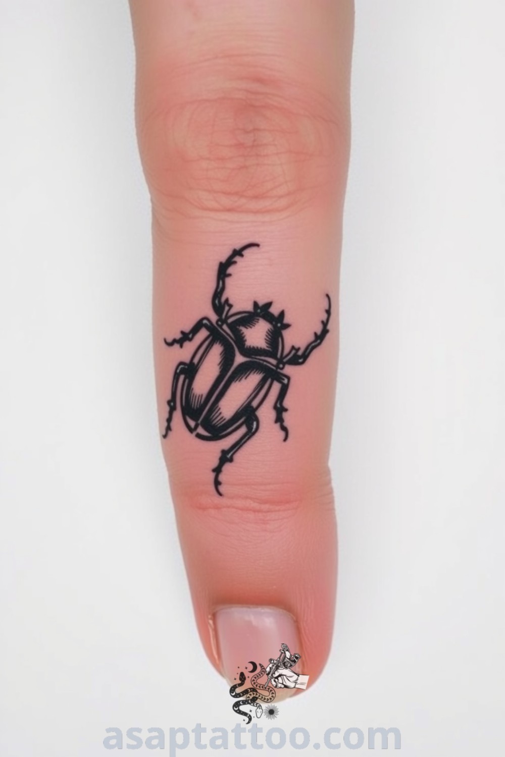 Elegant beetle tattoo featuring intricate linework and dark ink, showcasing detailed design elements that inspire and captivate. Best tattoo ideas you have to see to believe. asaptattoo.com