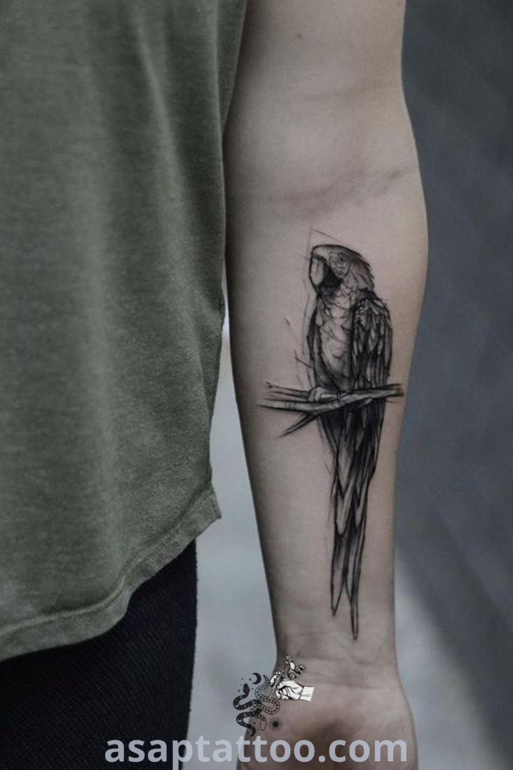 Black and white cockatiel tattoo on arm, featuring elegant feather details, perfect for nature lovers and tattoo enthusiasts. An inspiring choice for bird tattoo sleeves that you must see at asaptattoo.com.
