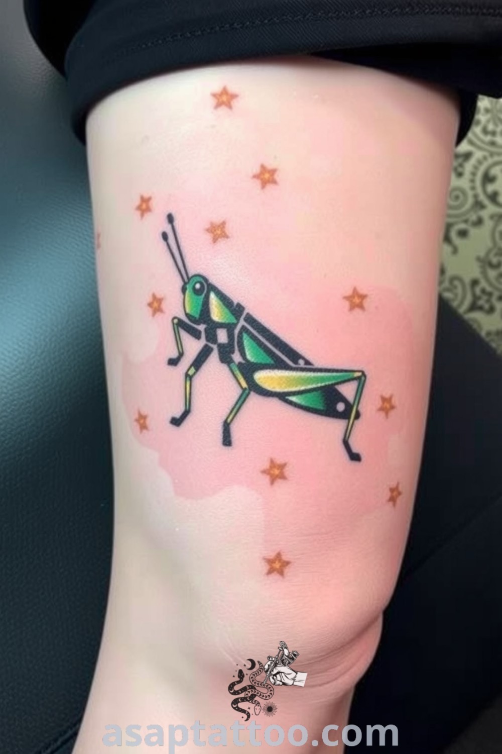 Grasshopper stencil tattoo with bold lines and gradient greens and blacks, symbolizing resilience and agility. A gorgeous tattoo idea you must see to believe. asaptattoo.com